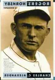 Portrait of baseball player in hat.