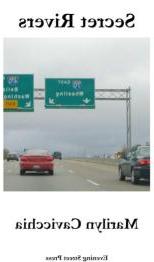 Cars on highway with signs overhead indicating 70 East towards Wheeling.